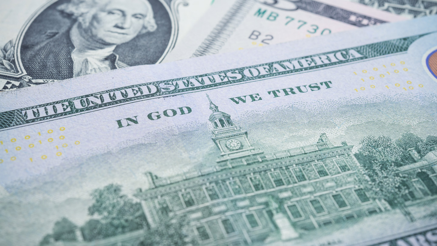 Ein-Dollar-Note mit dem berühmten Aufruck "In god we trust"
